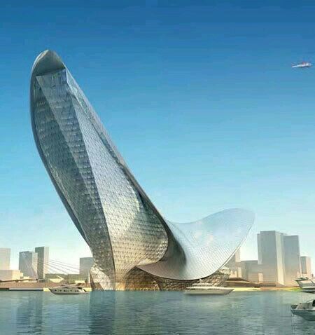 clear sky, blue, water, architecture, built structure, building exterior, city, modern, waterfront, sea, skyscraper, transportation, nautical vessel, river, sunlight, copy space, travel, day, cityscape, outdoors