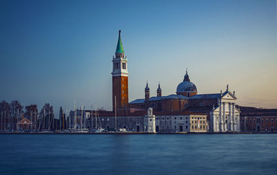 Church of san giorgio maggiore at sunset with the canal grande and the giudecca canal empty 