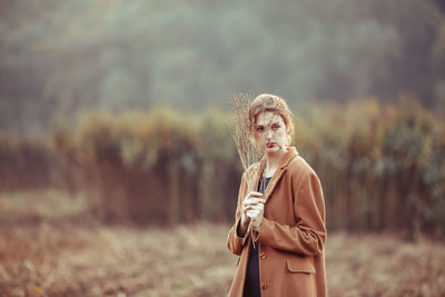 Mid adult woman looking away