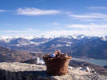 Scenic view of snowcapped mountains against sky