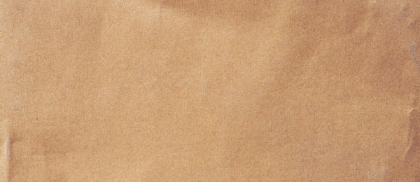 Close up crumpled brown paper texture and background with copy space