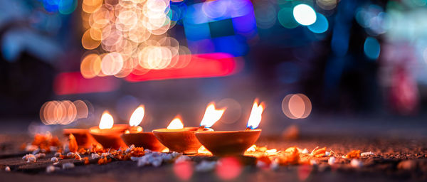 Close-up of burning candles