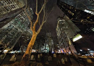 Low angle view of illuminated building at night