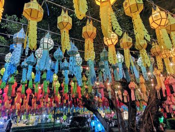 Low angle view of illuminated lanterns hanging in market