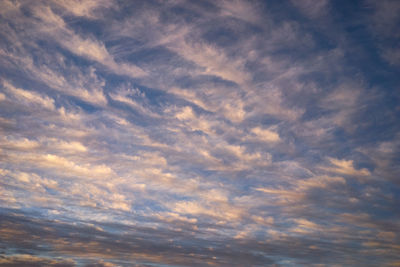 Low angle view of dramatic sky during sunset