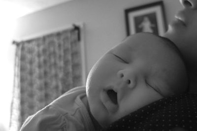 Close-up of cute baby at home