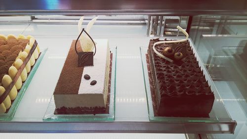 High angle view of cakes in retail display at shop