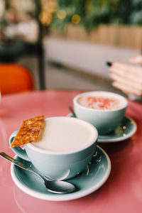 Close-up of cup of coffee on table