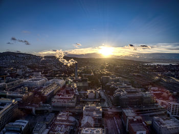 High angle view of city against sky during sunset