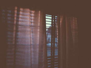 Close-up of curtained window