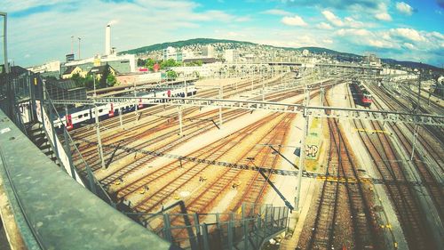 High angle view of train in city against sky