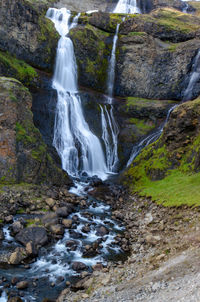 Scenic view of waterfall in forest