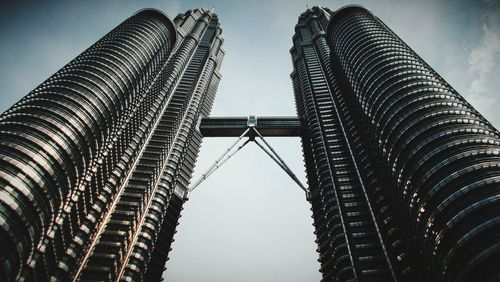 Low angle view of skyscraper against sky