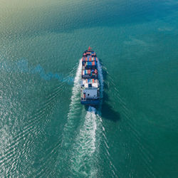 High angle view of ship sailing on sea