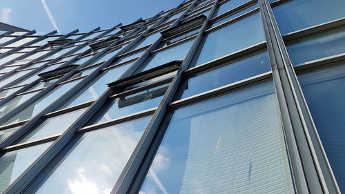 Low angle view of modern building against sky