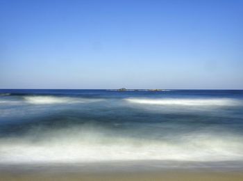 Scenic view of sea against clear sky