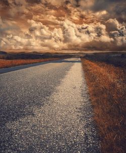 Empty road at sunset