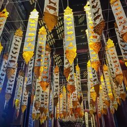 Low angle view of lanterns hanging at market stall