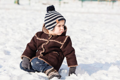 Full length of cute girl in snow