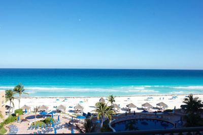 Scenic view of sea against blue sky