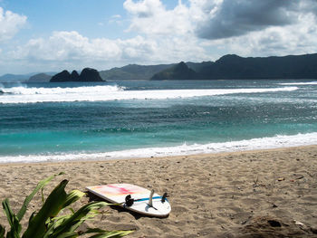 Scenic view of beach against sky