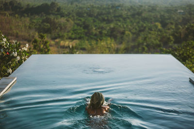 High angle view of woman in swimming pool