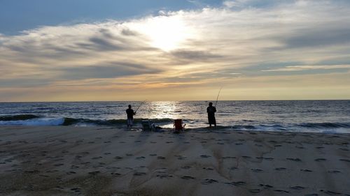 Scenic view of sea at sunset