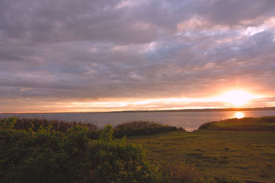 Scenic view of sea against sky during sunset