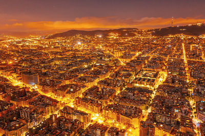 View of the residential areas of barcelona at night. city from a bird eye view