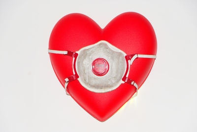 Close-up of heart shape over white background