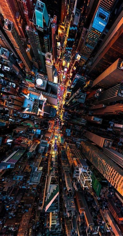 HIGH ANGLE VIEW OF CITY BUILDINGS AT NIGHT