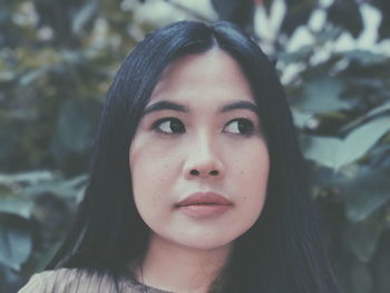 Close-up portrait of young woman