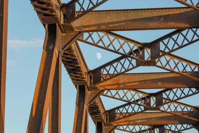 Low angle view of bridge and moon