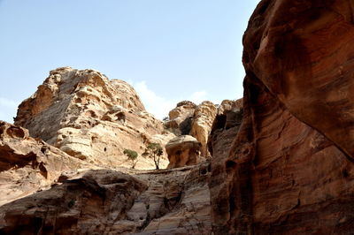 Low angle view of rock formations in jordan at petra