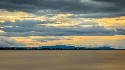 Scenic view of landscape against sky during sunset