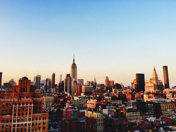 Cityscape against clear sky