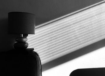 Close-up of electric lamp on wall