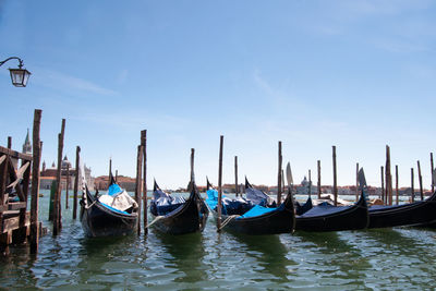 Gondolas moored for the night at dawn in venice