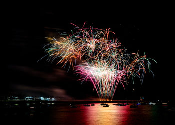 Firework display at night