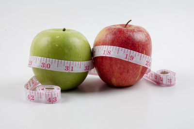 Close-up of apple against white background