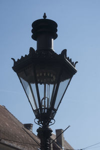 Low angle view of street light against clear sky