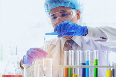 Close-up of scientist working in laboratory