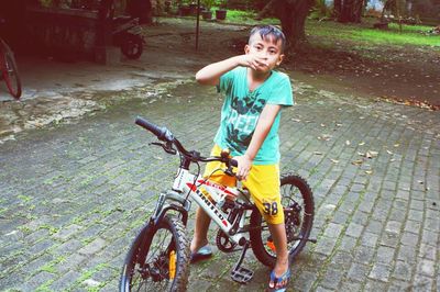 Boy riding bicycle