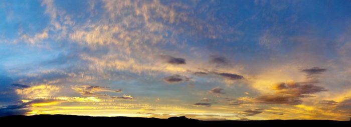 Low angle view of dramatic sky during sunset