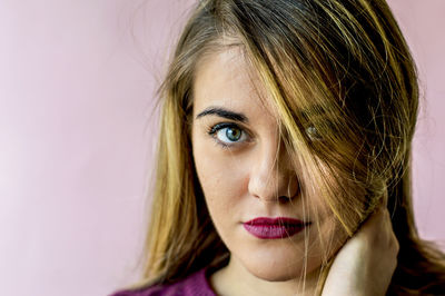 Close-up portrait of young woman