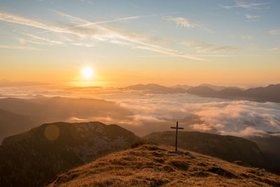 Scenic view of mountains against sky during sunset