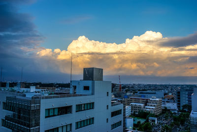 Cityscape against sky during sunset