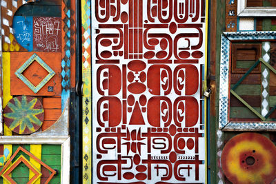 Full frame shot of multi colored text on door