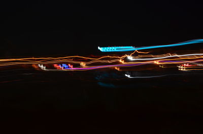 Light trails on bridge at night