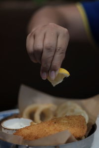 Close-up of hand holding bread